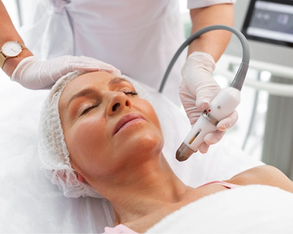 woman receiving a facial treatment